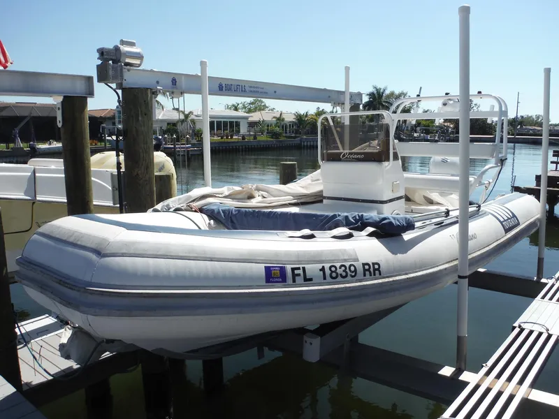 Slide: The Image of 2000 Novurania MX 530 DL boat docked at marina, Florida registration FL 1839 RR. - 4