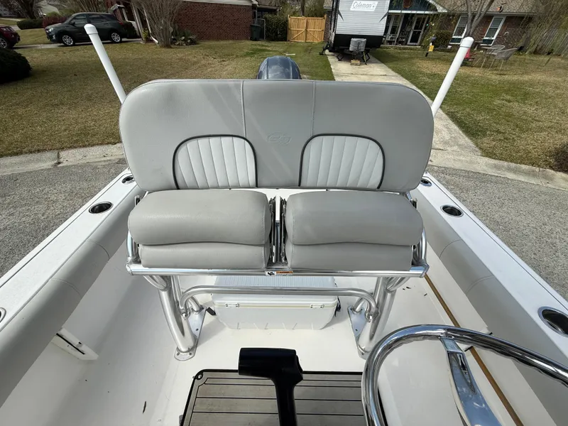 Slide: The Image of 2020 Sea Fox 206 Commander boat seating area with cushioned seats and steering wheel. - 13