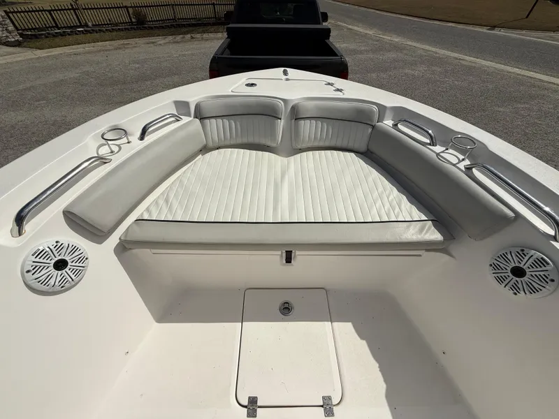 Slide: The Image of 2020 Sea Fox 206 Commander boat interior with cushioned seating and cup holders. - 14