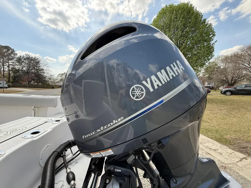 Slide: The Image of Yamaha outboard motor on 2020 Sea Fox 206 Commander boat, parked outdoors. - 6