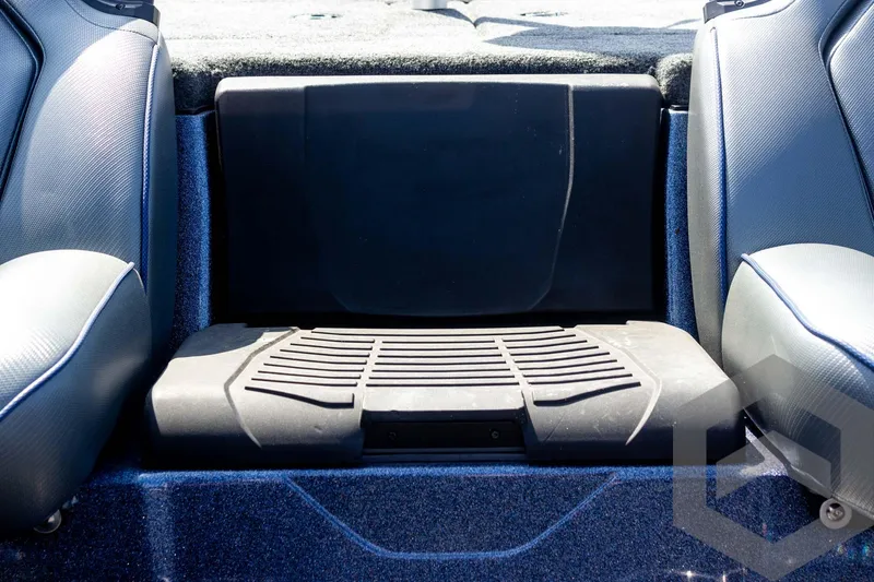 Slide: The Image of 2023 Skeeter ZXR 20 boat interior seating area with textured design. - 30