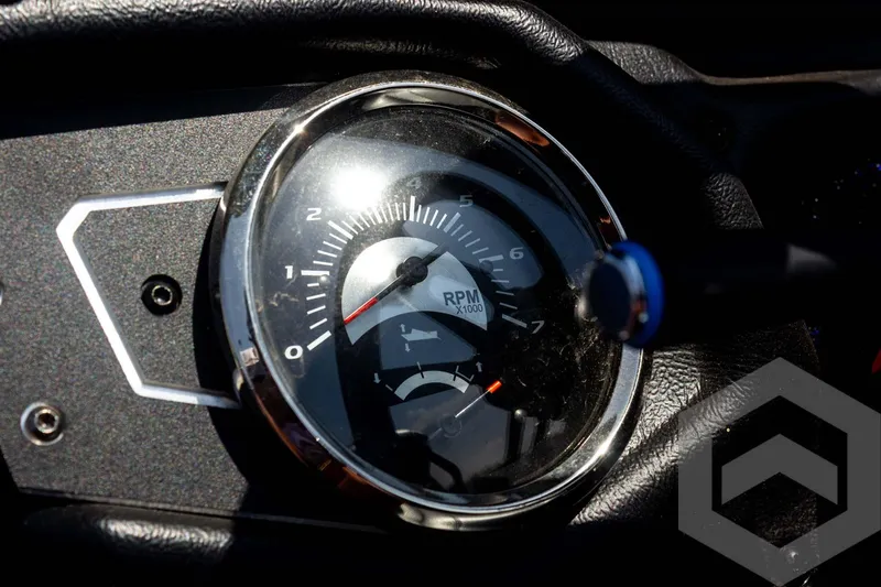 Slide: The Image of 2023 Skeeter ZXR 20 dashboard with RPM gauge and sleek design. - 36