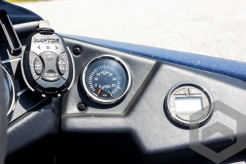 Slide: The Image of 2023 Skeeter ZXR 20 dashboard with water pressure gauge and control panel. - 38