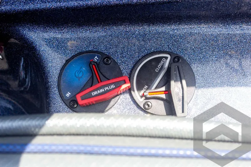 Slide: The Image of 2023 Skeeter ZXR 20 boat drain plug and valve controls. - 40