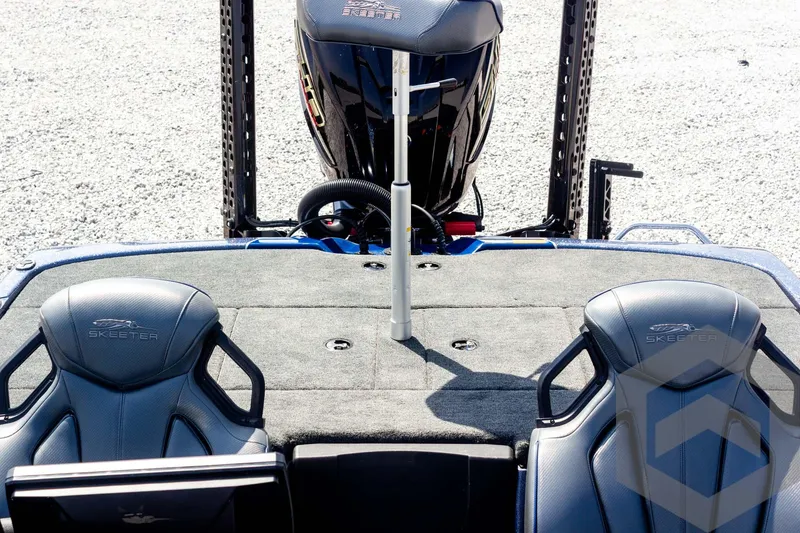 Slide: The Image of 2023 Skeeter ZXR 20 boat interior with dual seats and motor. - 41