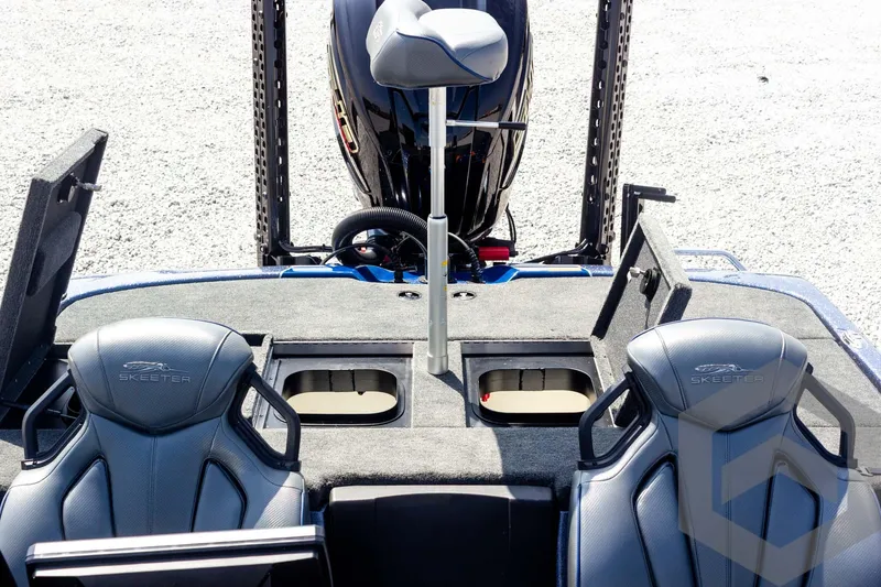 Slide: The Image of 2023 Skeeter ZXR 20 boat interior with dual seats and storage compartments. - 42