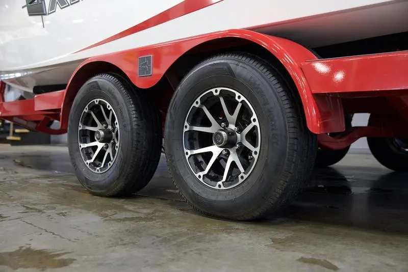 Slide: The Image of Red trailer with dual wheels for 2020 Axis A24 boat. - 4