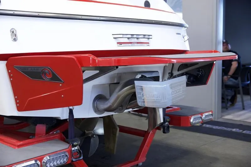 Slide: The Image of 2020 Axis A24 boat rear view with red accents and exhaust system. - 5