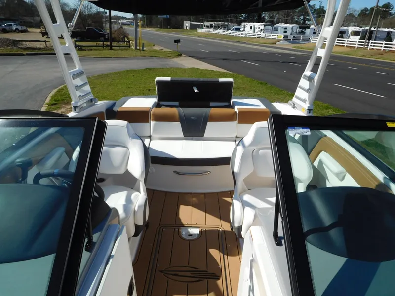 Slide: The Image of 2025 Chaparral 21 SSi boat interior with sleek seating and modern design. - 2