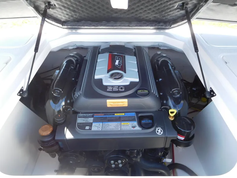 Slide: The Image of 2025 Chaparral 21 SSi boat engine compartment with powerful 250 horsepower engine. - 9
