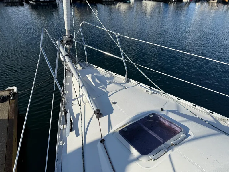Slide: The Image of Deck view of 1999 Jeanneau Sun Odyssey 36.2 sailboat at marina. - 29