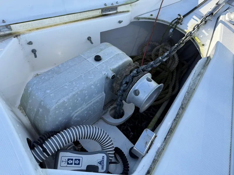Slide: The Image of Anchor windlass on 1999 Jeanneau Sun Odyssey 36.2 sailboat deck. - 32