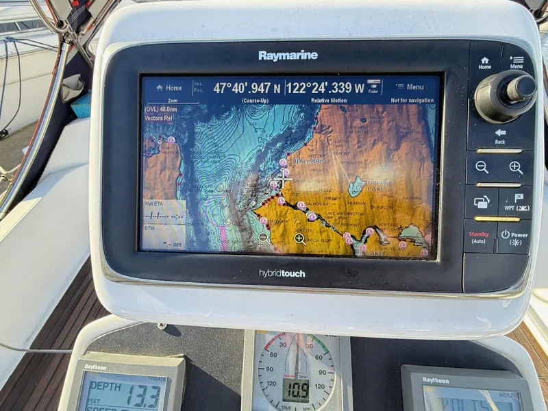 Slide: The Image of Navigation system on Jeanneau Sun Odyssey 36.2, displaying nautical chart and coordinates. - 37