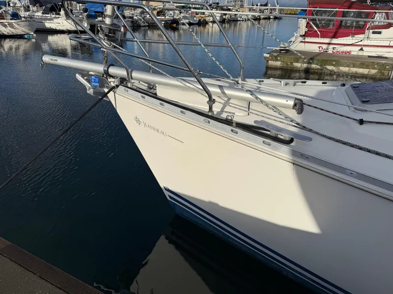 Slide: The Image of Jeanneau Sun Odyssey 36.2 sailboat docked in marina, 1999 model, side view. - 4