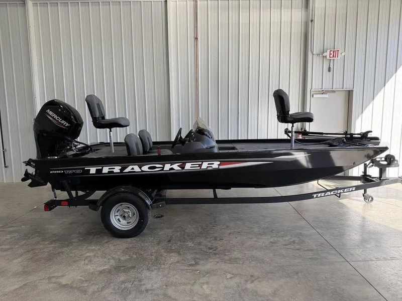 The Image of 2025 Tracker Pro 170 fishing boat in a showroom, side view. - 1