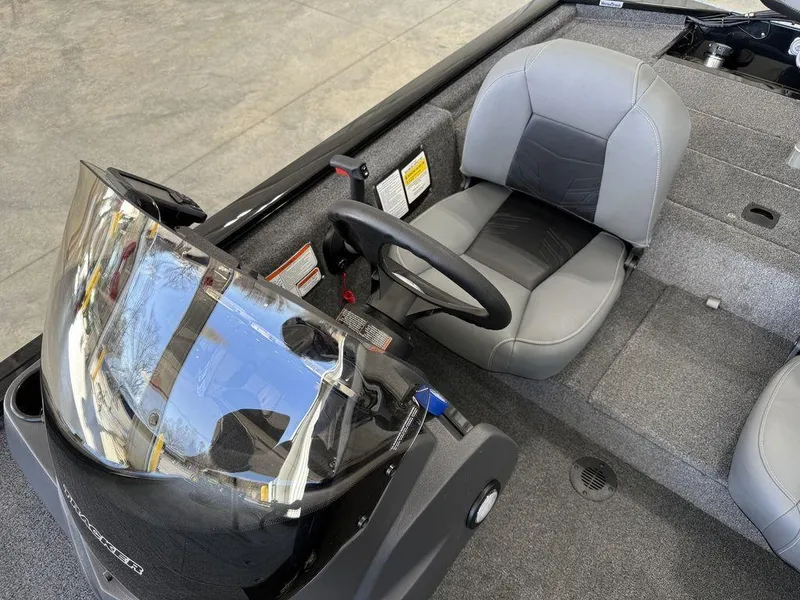 Slide: The Image of 2025 Tracker Pro 170 boat interior with steering wheel and seating. - 10