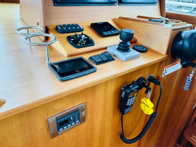 Slide: The Image of Control panel of a 2011 Sabre 40 Sedan yacht with navigation equipment. - 31