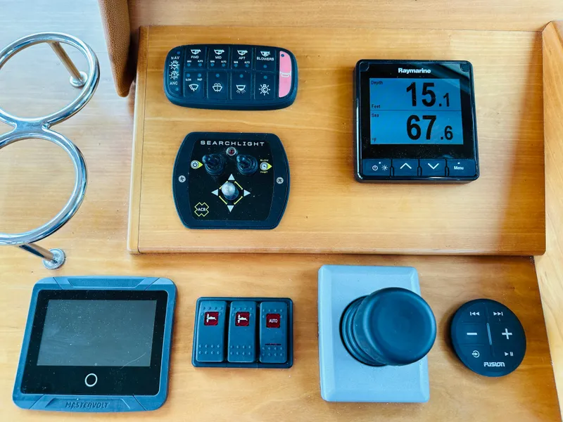 Slide: The Image of Control panel of a 2011 Sabre 40 Sedan with navigation and electronic controls. - 32