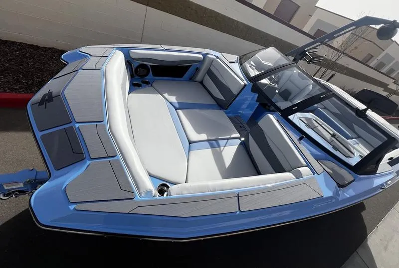Slide: The Image of 2025 Axis A225 boat with sleek blue and gray interior design. - 9