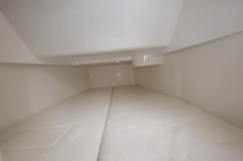 Slide: The Image of Interior cabin of 2020 HCB Speciale boat, featuring spacious white design. - 29