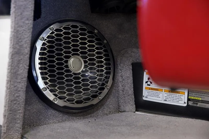 Slide: The Image of Close-up of a speaker in a 2014 Malibu 247 LSV boat interior. - 10