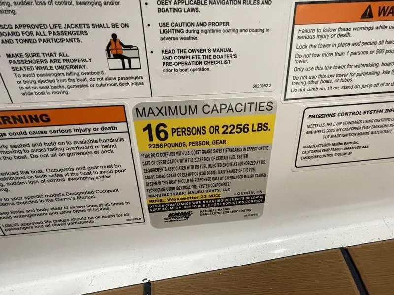 Slide: The Image of 2025 Malibu 23 MXZ capacity label: 16 persons or 2256 lbs maximum load. - 11