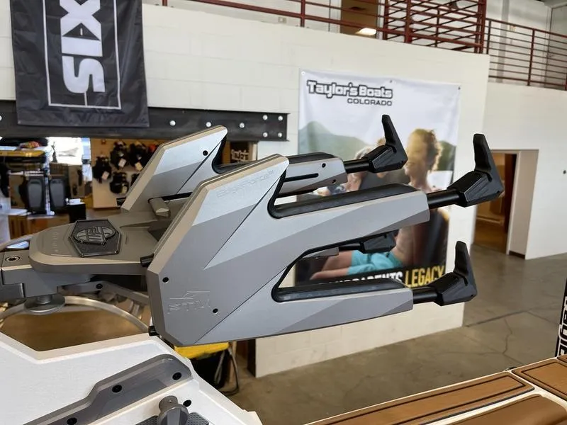 Slide: The Image of 2025 Malibu 23 MXZ boat accessory in showroom, featuring sleek design and advanced technology. - 19