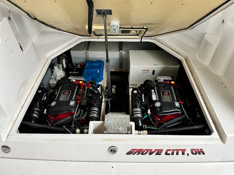 Slide: The Image of Engine compartment of 2006 Regal Commodore 3560 IO boat, featuring dual engines, Grove City, OH. - 18