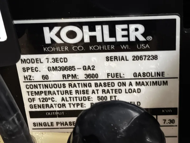 Slide: The Image of Kohler generator label, model 7.3ECD, gasoline, 60 Hz, 3600 RPM, single phase, 7.30 kW. - 26