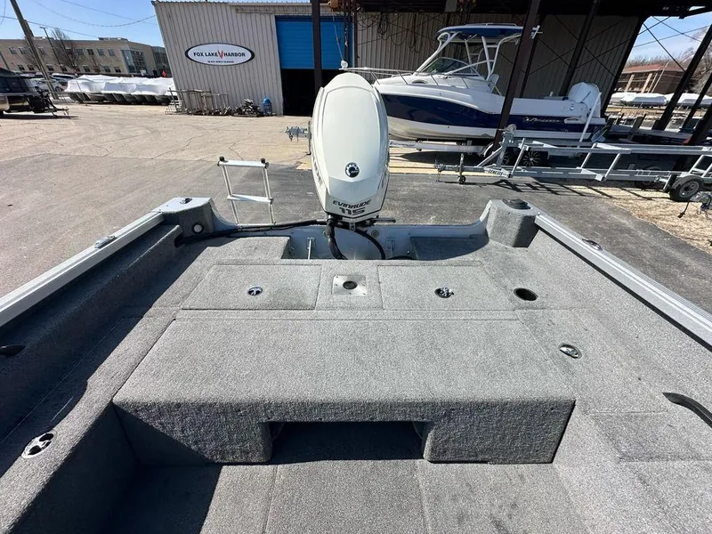 Slide: The Image of 2014 Alumacraft Competitor 175 CS boat with Evinrude motor at Fox Lake Harbor. - 14