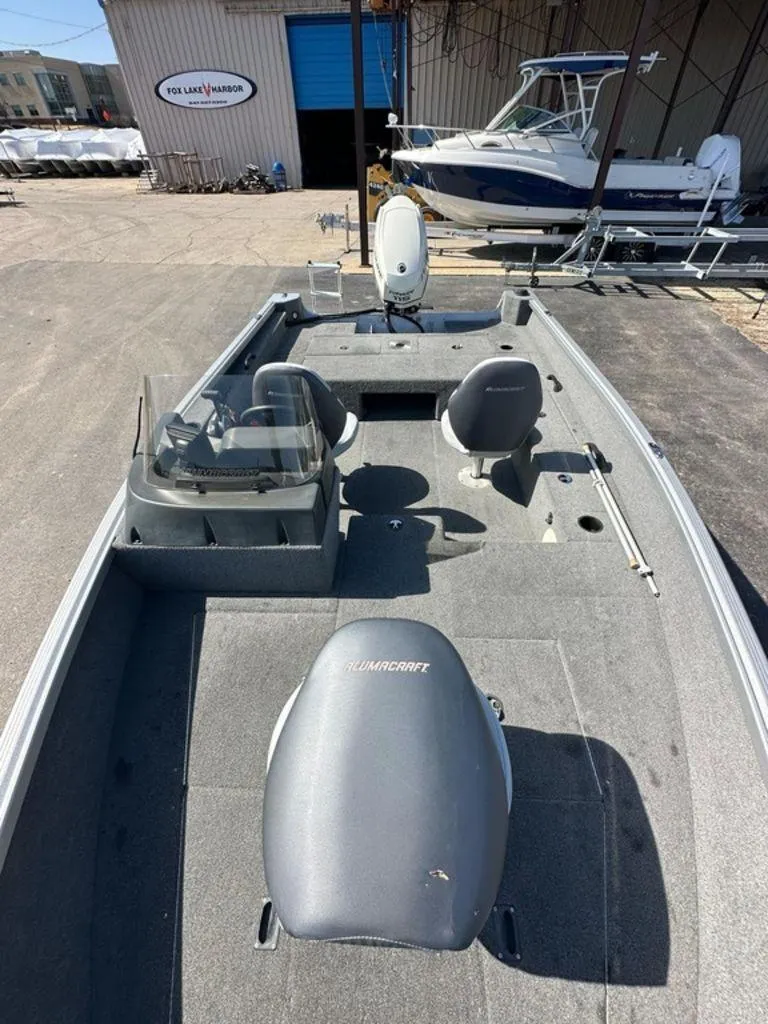 Slide: The Image of 2014 Alumacraft Competitor 175 CS fishing boat at Fox Lake Harbor. - 7