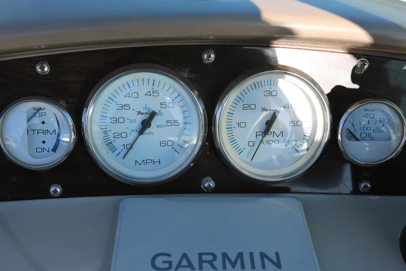 Slide: The Image of Dashboard gauges of 2005 Chaparral 236 Sunesta with Garmin device. - 15