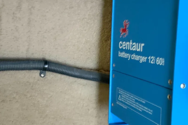 Slide: The Image of Centaur battery charger on wall, Chaparral 236 Sunesta 2005 model. - 39