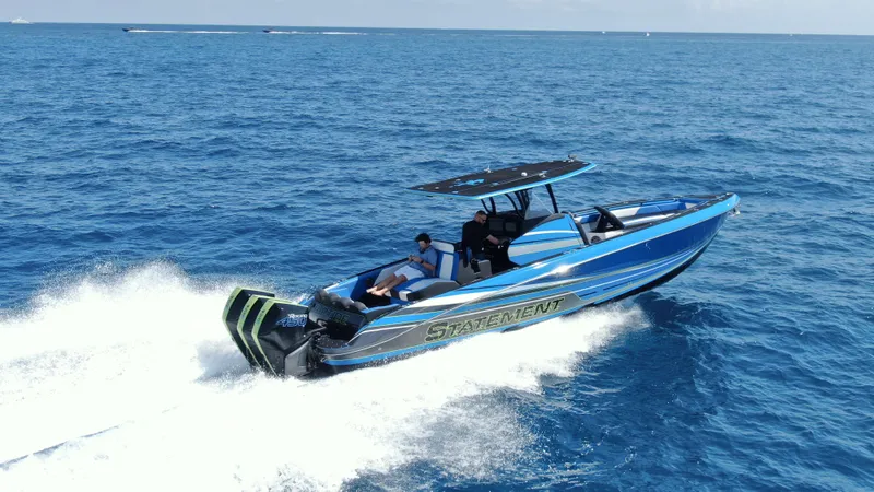 Slide: The Image of 2023 Statement 380 Open boat cruising on the ocean, showcasing sleek design and powerful performance. - 2