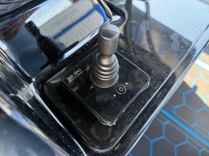 Slide: The Image of NiteTrack camera on 2023 Statement 380 Open boat, docked with clear sky background. - 40