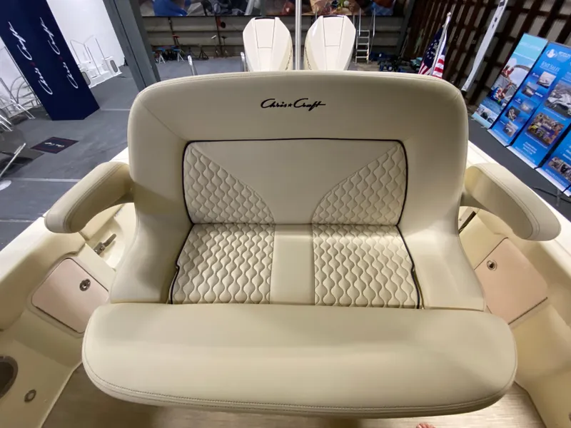 Slide: The Image of 2026 Chris-Craft Catalina 28 interior with toilet and seating, featuring modern marine design. - 21