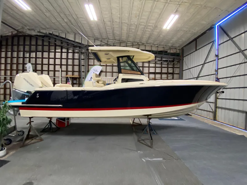 Slide: The Image of 2026 Chris-Craft Catalina 28 boat displayed indoors at Petzold's Yacht Sales. - 3