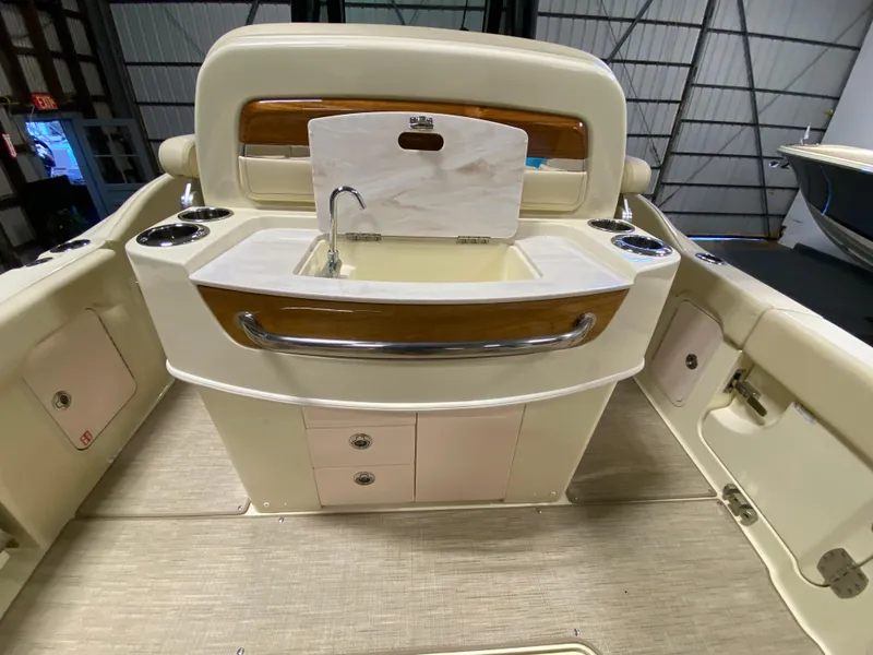 Slide: The Image of 2026 Chris-Craft Catalina 28 boat interior with beige seating and elegant design. - 8