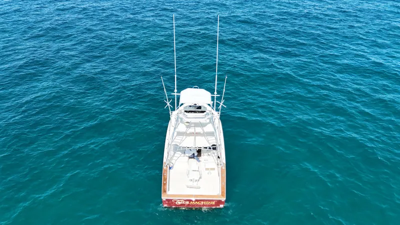 Slide: The Image of 1990 Gulf Stream Yachts 31 Tournament on open sea, aerial view. - 8