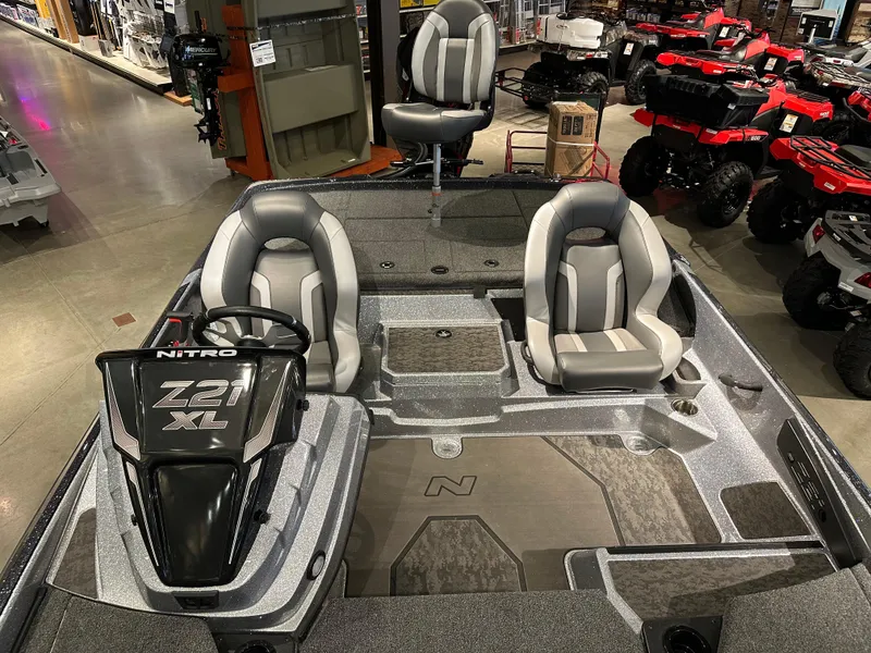 Slide: The Image of 2025 Nitro Z21 XL boat interior with three seats and modern design. - 3
