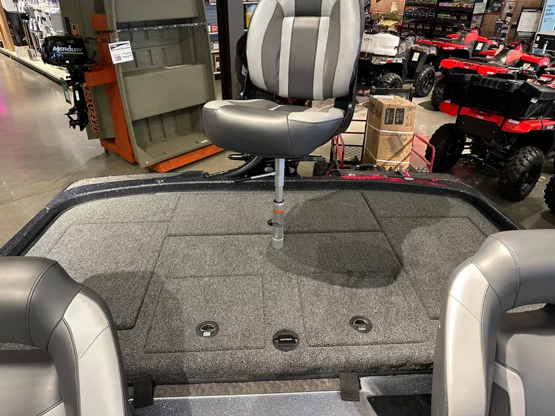 Slide: The Image of 2025 Nitro Z21 XL boat interior with gray seating and storage compartments. - 4