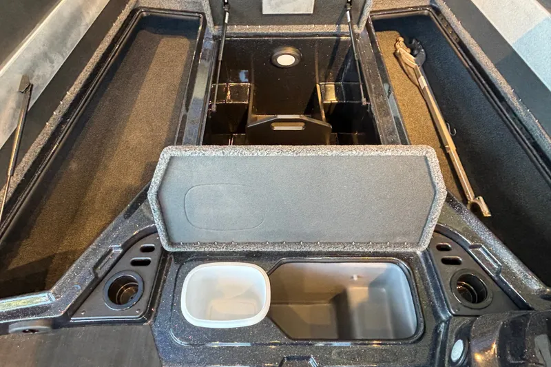Slide: The Image of Interior storage compartments of a 2025 Nitro Z19 boat, featuring organized spaces and sleek design. - 5