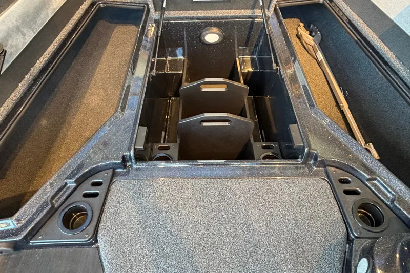 Slide: The Image of Interior storage compartments of a 2025 Nitro Z19 boat, showcasing organized layout. - 4
