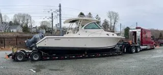 Slide: The Image of 2014 Pursuit OS 345 Offshore boat on trailer, ready for transport. - 29