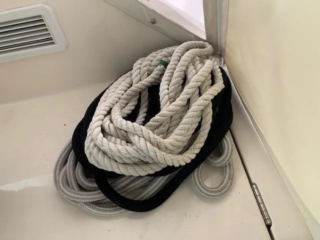 Slide: The Image of Coiled rope on 2014 Pursuit OS 345 Offshore boat deck. - 36