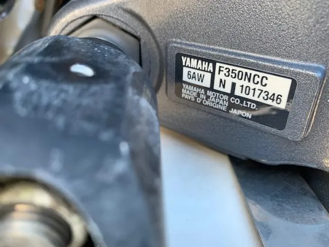 Slide: The Image of Close-up of Yamaha F350NCC engine label on 2014 Pursuit OS 345 Offshore boat. - 45