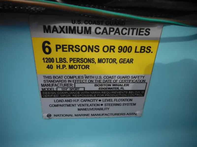 Slide: The Image of 1998 Boston Whaler 13 Sport capacity label: 6 persons or 900 lbs, 40 HP motor. - 20
