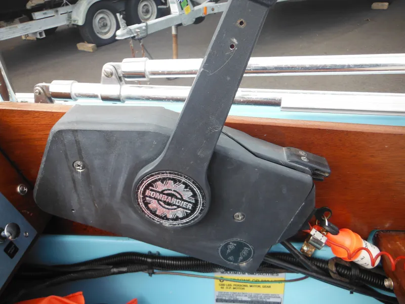 Slide: The Image of Control panel of a 1998 Boston Whaler 13 Sport boat with Bombardier throttle. - 22
