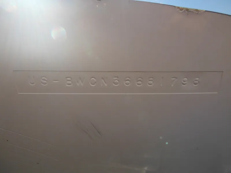 Slide: The Image of Hull identification number on 1998 Boston Whaler 13 Sport boat. - 5