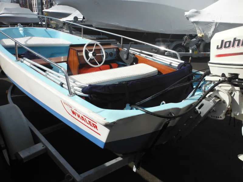 Slide: The Image of 1998 Boston Whaler 13 Sport boat with Johnson outboard motor on trailer. - 6